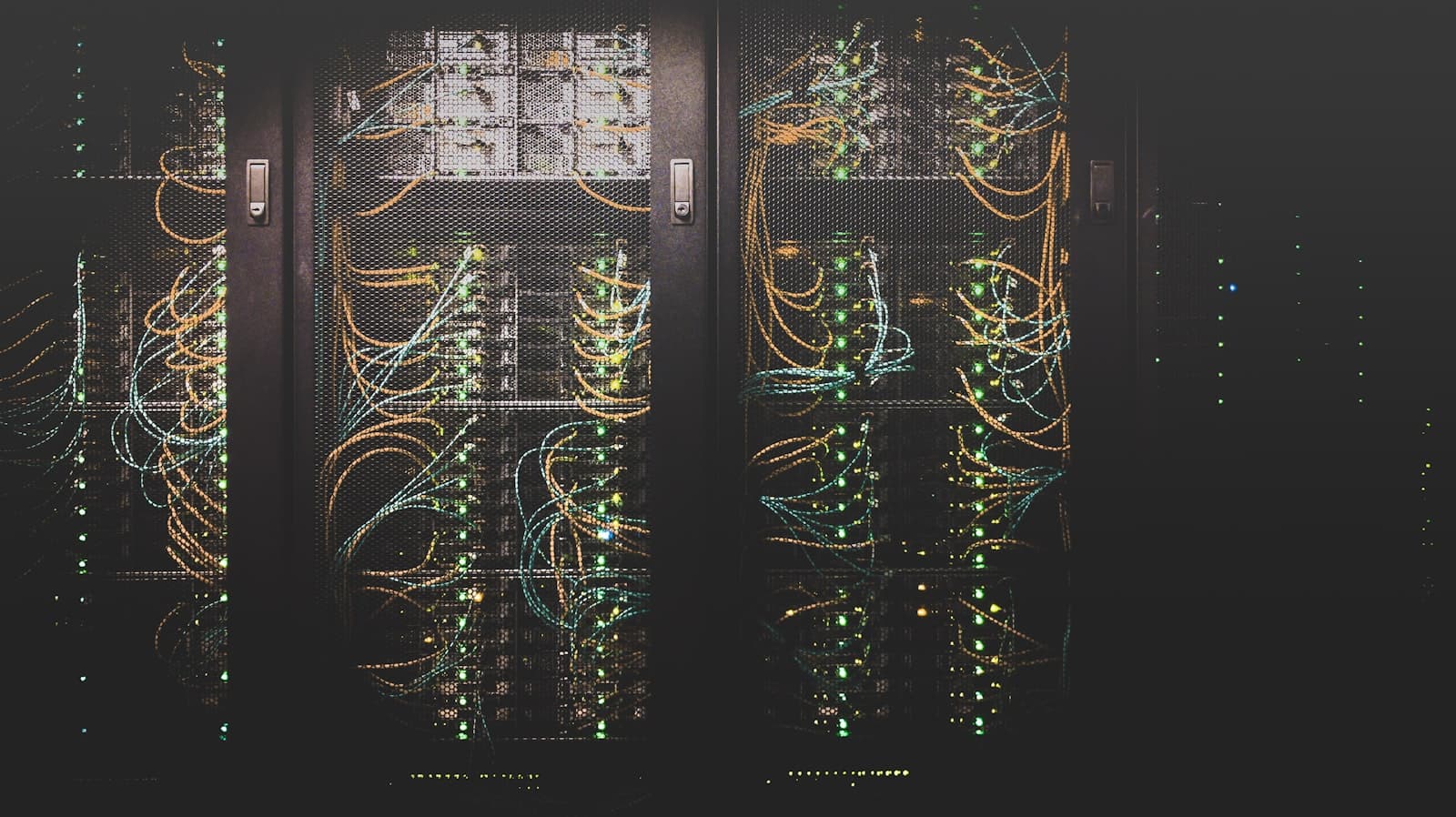 Server racks and technology infrastructure, representing enterprise database operations
